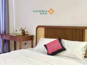 Ένα ή περισσότερα κρεβάτια σε δωμάτιο στο Namora House KG Kết Nối