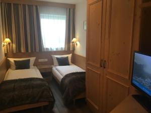 Postel nebo postele na pokoji v ubytování Haus Zangerl inkl Sommer-Karte Premium
