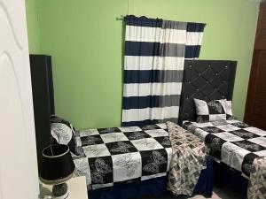 Voodi või voodid majutusasutuse Netfa Cozy Gem toas