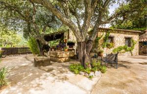 A garden outside Cozy Home In Algatocin With Kitchenette