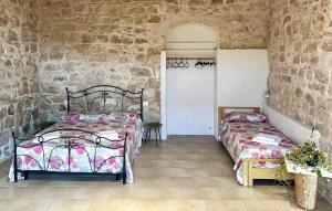 Ένα ή περισσότερα κρεβάτια σε δωμάτιο στο La Cascina Di Stefania