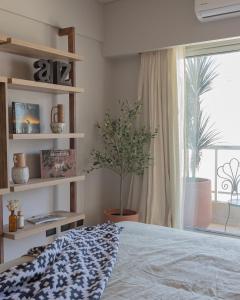 Giường trong phòng chung tại FreeDom Paseo de la Cisterna UF30 +18 ảnh