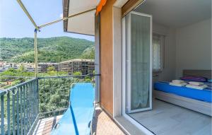 a balcony with a view of a mountain at Stunning Apartment In Recco With Wifi in Recco