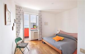 A bed or beds in a room at Stunning Home In Celle Ligure Sv,