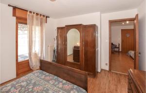 Posteľ alebo postele v izbe v ubytovaní Casa Maria Grazia