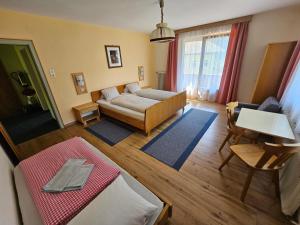 Postel nebo postele na pokoji v ubytování Haus Valentin
