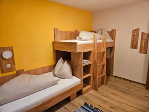 Postel nebo postele na pokoji v ubytování Haus Valentin