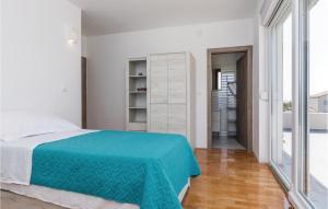 Postel nebo postele na pokoji v ubytování Three-Bedroom Holiday Home In Kozino