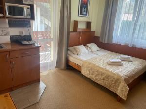 Krevet ili kreveti u jedinici u objektu Willa Stenia Apartamenty