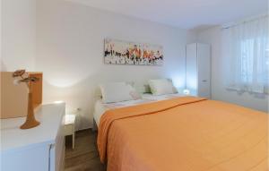 Postel nebo postele na pokoji v ubytování Apartment Premantura Iii