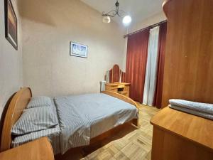 Posteľ alebo postele v izbe v ubytovaní Апартаменти 4-кімнатні в центрі, поруч Майдан Незалежності