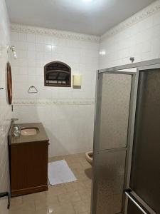 Ένα μπάνιο στο Casa pé na areia com vista deslumbrante