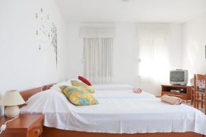 Ліжко або ліжка в номері Apartments Villa Lilly