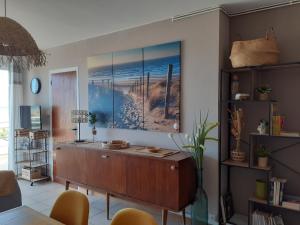 Χώρος καθιστικού στο Appartement face mer Rêve de Flo ts