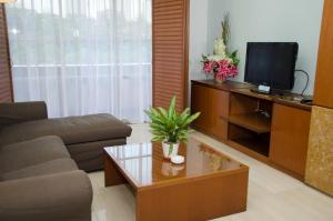 TV a/nebo společenská místnost v ubytování The Maple Suite