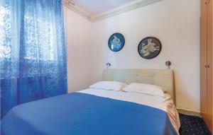 Postel nebo postele na pokoji v ubytování Holiday Home Podstrana - 04