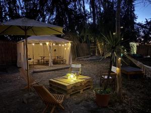 Zahrada ubytování Glamping El Arbol - Naturaleza y Mar + 51 fotografií