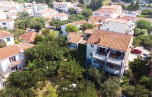 an aerial view of a town with houses at One-Bedroom Apartment In Klek in Klek