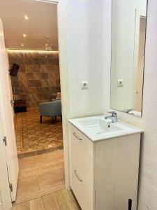 Kúpeľňa v ubytovaní Apartamento tradición de la Corredera + 16 fotografií
