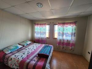 Postel nebo postele na pokoji v ubytování Cabañas Horizonte Azul