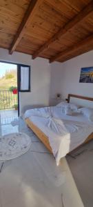 Postel nebo postele na pokoji v ubytování Hotel Restorant Olti