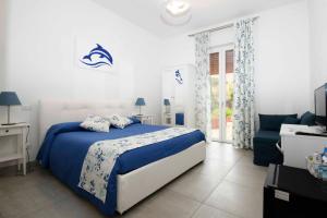 Posteľ alebo postele v izbe v ubytovaní B&B Marina House Porto Ercole