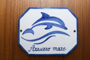 Certifikát, ocenenie alebo iný dokument vystavený v ubytovaní B&B Marina House Porto Ercole