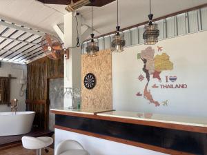 a bathroom with a toilet and a sink and a tub at Baan Isla Hideaway in Ko Lanta +21 photos