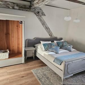 Postel nebo postele na pokoji v ubytování Krzywa Apartamenty