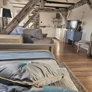 Posezení v ubytování Krzywa Apartamenty + 31 fotografií