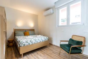 Postel nebo postele na pokoji v ubytování Casa Bebe & Gardens