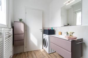 Kuchyň nebo kuchyňský kout v ubytování Casa Bebe & Gardens