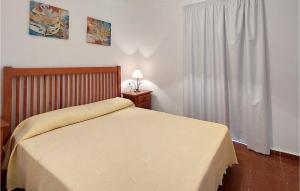 A bed or beds in a room at Pet Friendly Apartment