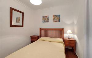 A bed or beds in a room at Pet Friendly Apartment