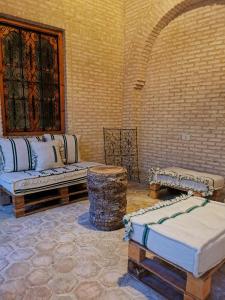 Postel nebo postele na pokoji v ubytování Maison de Vacances "Dar Khalifa"