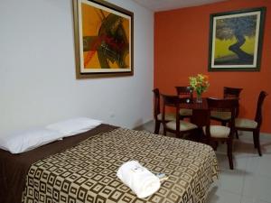 Katil atau katil-katil dalam bilik di Hotel Perú Hosting - Piura