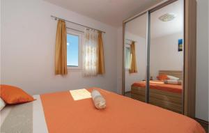 Postel nebo postele na pokoji v ubytování Holiday Home Vela Luka 06