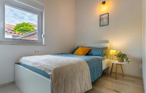 Posteľ alebo postele v izbe v ubytovaní Cozy Home In Betiga With Sauna