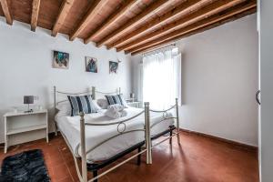 Katil atau katil-katil dalam bilik di Hoslty-Suite l'Arancio-Enjoy the Historical Center