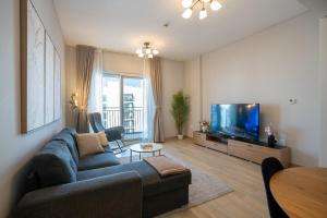 Χώρος καθιστικού στο Yas Winter Dreamstay 1bhk