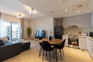 Η κουζίνα ή μικρή κουζίνα στο Yas Winter Dreamstay 1bhk