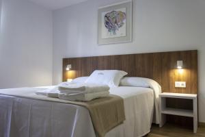 Postel nebo postele na pokoji v ubytování Alen de Louro - Apartamento 5 Ardeleiro