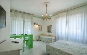 A bed or beds in a room at Gorgeous Apartment In Cattolica