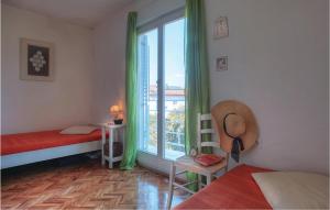 Postel nebo postele na pokoji v ubytování Holiday Home Murter With Sea View 01