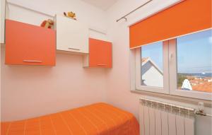 Postel nebo postele na pokoji v ubytování Apartment Supetar Ive Vojnovica