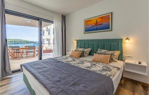 Posteľ alebo postele v izbe v ubytovaní 2 Bedroom Gorgeous Apartment In Banjole