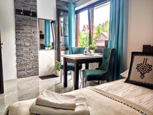 Posedenie v ubytovaní Pokoje i apartamenty u Sabiny - DOSTĘP DO JACUZZI TYLKO W WYBRANYCH OPCJACH sprawdź poniżej szczegóły rezerwacji