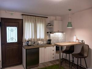 Kuchyň nebo kuchyňský kout v ubytování GOURA House