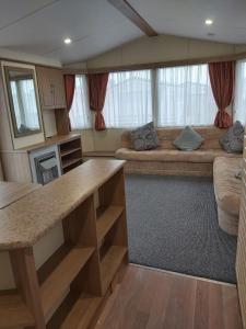 Kuchyň nebo kuchyňský kout v ubytování Cozee Stays Holiday Home