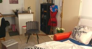 Ένα ή περισσότερα κρεβάτια σε δωμάτιο στο Studio cosy 33